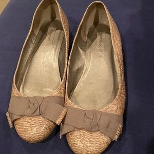 Shoestock Beige Patterned Flats with darker beige bow.